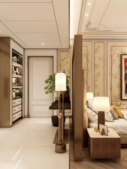 A Parisian-style primary suite in a Worli Sea Face high-rise, spanning an impressive 2,000 sq. ft. The design features opulent marble, warm wood flooring, and brass accents, with a large, bold artwork making a statement above the bed.