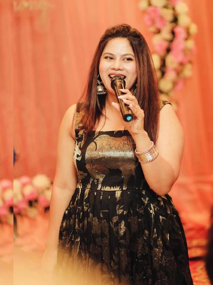 On the mic, ready to go. A close-up shot showing my focus before starting a segment.