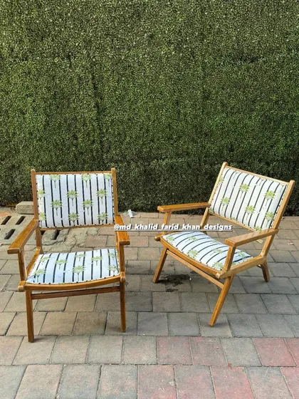 Front view of the custom upholstered easy chairs.