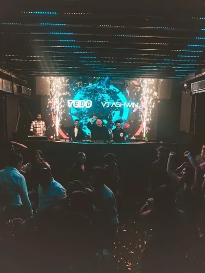 A wide view of the club with pyro going off, showing the full scale of the production I bring to my shows.