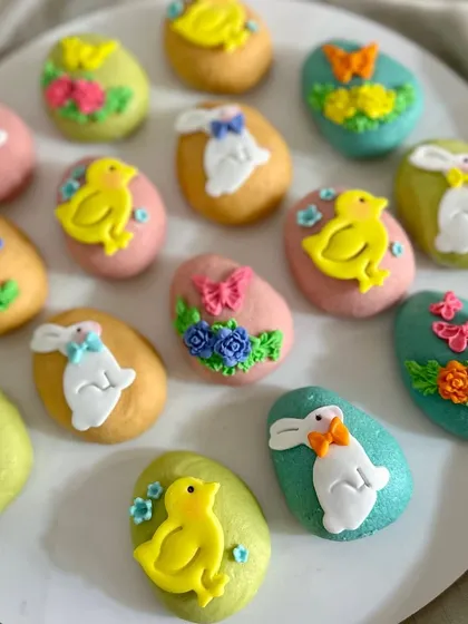 I take great care in decorating each marzipan egg by hand. This batch features little chicks, bunnies with bow ties, and floral designs.