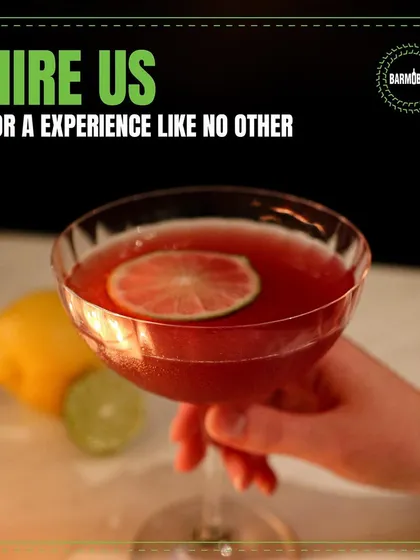 I aim to provide an experience, not just a service. Holding a freshly made Cosmopolitan, this image represents the quality and memorable moments I deliver.