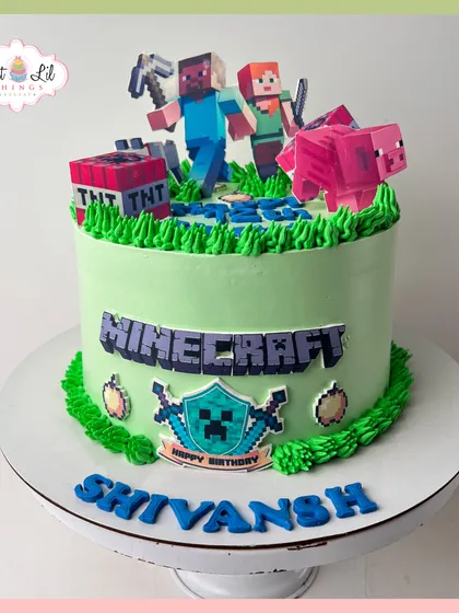 A classic Minecraft cake for a birthday celebration. This design features Steve, Alex, a pig, and TNT blocks on a signature green and brown pixelated landscape.
