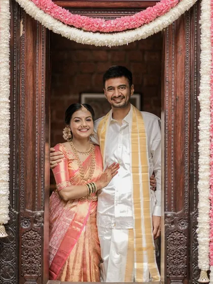 A lovely portrait of the couple. The bride's makeup is coordinated to look beautiful next to her groom, creating a harmonious picture.