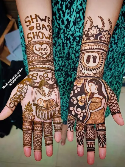 A clear, straight-on shot of the "Shweta's Baby Shower" mehandi, highlighting all the custom elements.