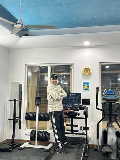 Posing on the treadmill.