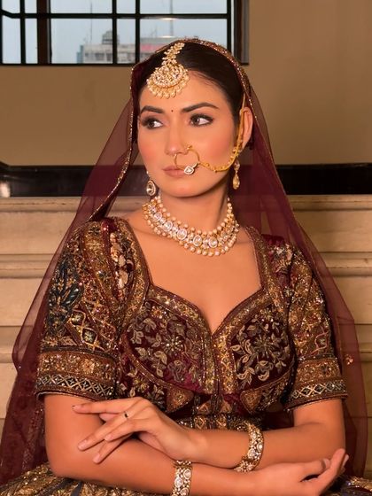 Another angle of this stunning bridal makeup. The contour is soft and natural, enhancing her bone structure while maintaining a skin-like texture.