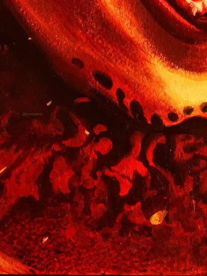 A detailed view of the lower part of the 'Kantara' painting, showing the abstract, fire-like textures. This element adds to the divine and powerful energy of the piece.