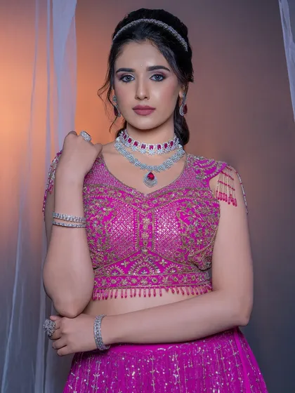 A portrait from the magenta lehenga shoot, showcasing the diamond and ruby jewelry.