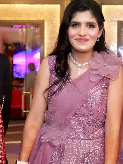 A candid shot from the party, her makeup looking fresh and flawless.