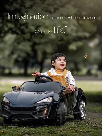 Imagination station where dreams come to life. A joyful boy in his toy car looks up as a butterfly flutters by.