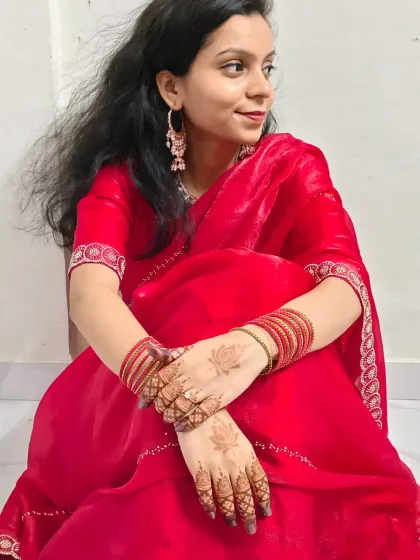 Another shot of this lovely client, showcasing her Chhath Puja look with her pretty lotus mehndi design.