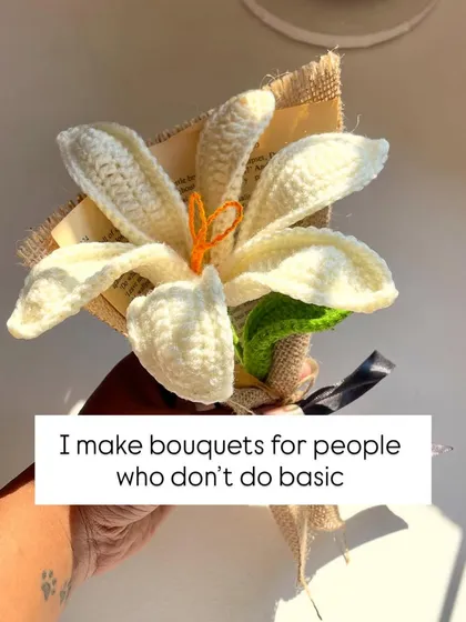 For those who don't do basic. This single, beautifully crafted white lily is wrapped in burlap and makes a statement of simple elegance. It's a unique alternative to a traditional bouquet.