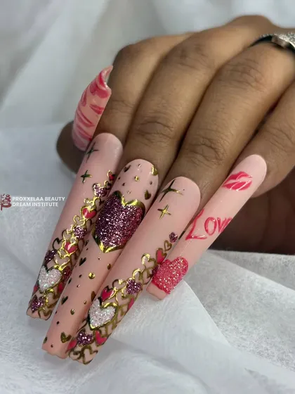 A closer look at the Valentine's themed set, highlighting the different textures from the sparkling glitter heart to the smooth, hand-painted details.