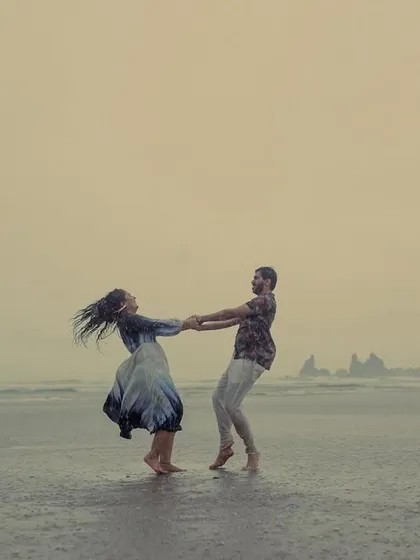 Some couples wait for the storm to pass; others dance in it. We captured this unscripted, joyful twirl during a sudden downpour in Goa. It’s a perfect example of how we find beauty in unplanned moments, creating images that are full of life and genuine emotion.