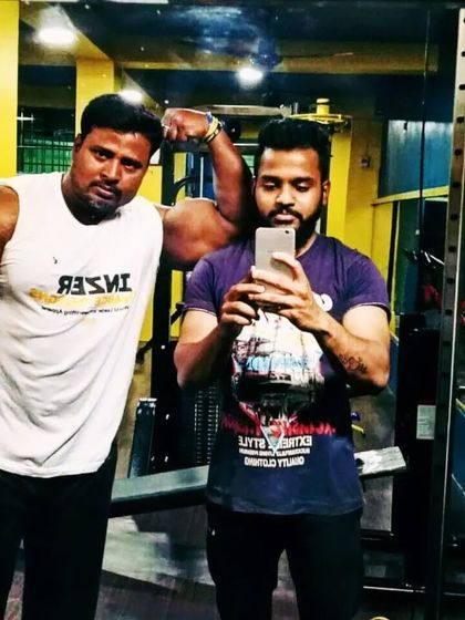 A quick selfie with a student. The gym is where we build not just muscle, but also lasting friendships.