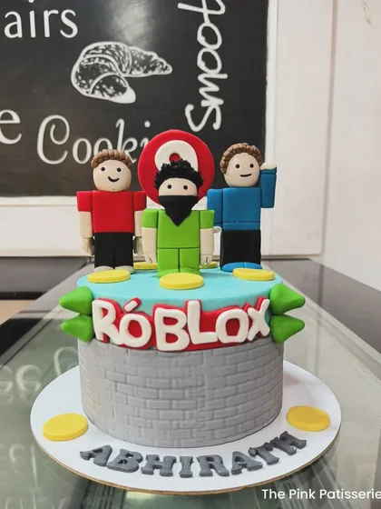 A clear, straight-on shot of the popular Roblox-themed custom cake.
