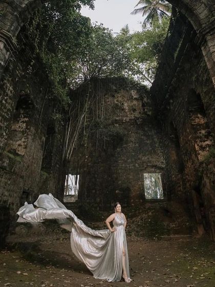 Looking incredible in our silver flying gown. This piece is perfect for creating dramatic and artistic pre-wedding photos.