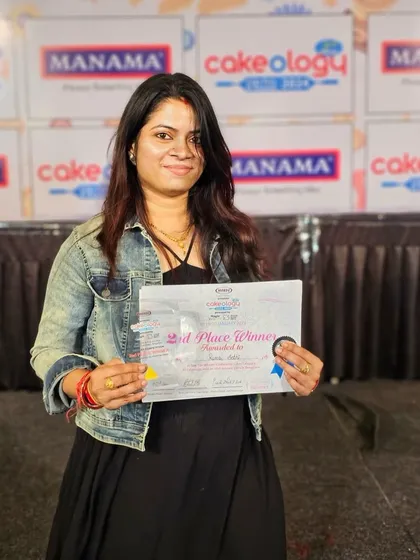 Holding my 2nd place winner's certificate. All the hard work paid off.