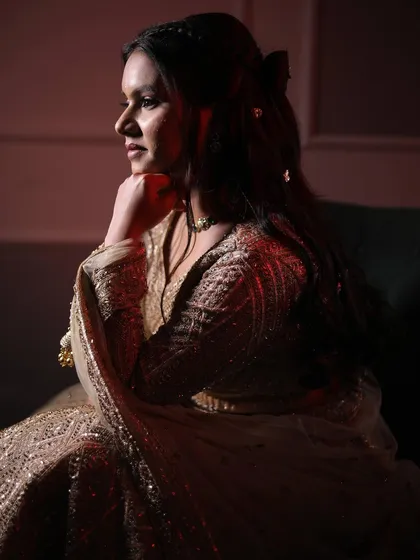 A beautiful profile shot of my bride. The soft hairstyle and glowing skin create a timeless and romantic feel.