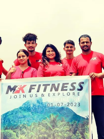 Another shot of our fitness club collaboration, celebrating a successful trek together. These events are great for team building and creating lasting memories.
