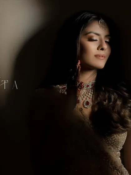 A dramatic and artistic portrait of Ishita during her engagement. We play with light and shadow to create images that are not just photos, but pieces of art that reflect the mood and emotion of the moment. This is modern bridal portraiture with a touch of vintage soul.