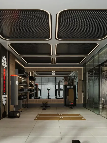 This commercial gym interior uses a dark, industrial aesthetic with dynamic ceiling lights to create an energetic and focused workout environment. The layout is planned for efficient equipment placement and user flow, featuring dedicated zones for different types of training.