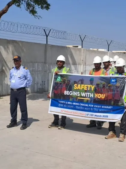 A team holds a "Safety Begins With You" banner. This message encapsulates our belief that a strong safety culture is built on individual responsibility and collective awareness.
