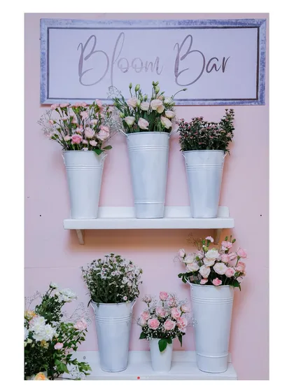 We love creating interactive experiences for guests. Our signature Bloom Bar allows guests to create their own bouquets as a party favor, adding a personal and engaging touch to any celebration.