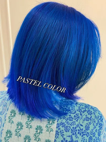 Blue hair doesn't care! A vibrant, pastel blue on a sharp bob cut.