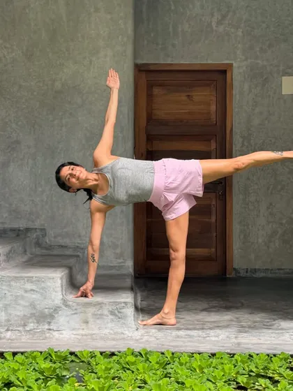 Finding your sweet spot in Ardha Chandrasana, or Half Moon Pose, is about finding balance. I teach how to use props like a wall to stabilize the pose, helping you feel your standing leg root down as your chest revolves open.