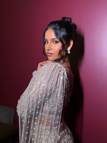 This pose captures the fierce and sexy vibe of the entire look. The makeup is designed to empower and make you feel like the best version of yourself.