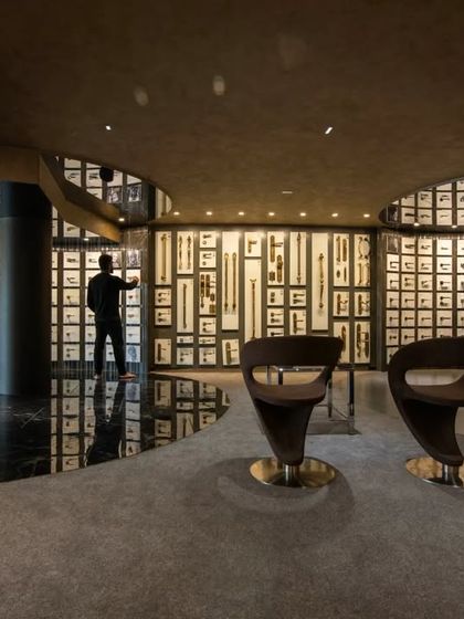 Additional views of the Gala showroom, showcasing the luxurious walk-in closet displays, the reflective marble floor, and the seamless integration of product showcases into the architectural design.