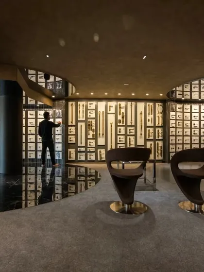 Additional views of the Gala showroom, showcasing the luxurious walk-in closet displays, the reflective marble floor, and the seamless integration of product showcases into the architectural design.
