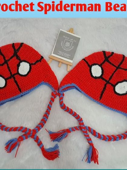 A pair of my handmade Spider-Man beanies, ready for two little heroes. I can customize the size for babies, kids, or even adults.