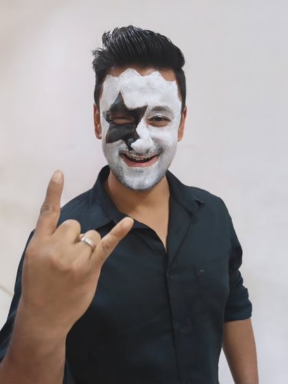Rock on. A student showing off his KISS-inspired face paint at our Halloween social. The creativity was off the charts.