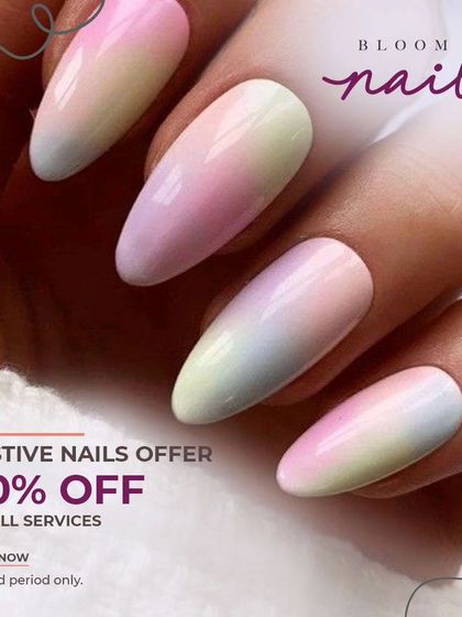 Another view of the glossy pastel rainbow ombré nails. The colors are soft yet vibrant, creating a beautiful watercolor effect.
