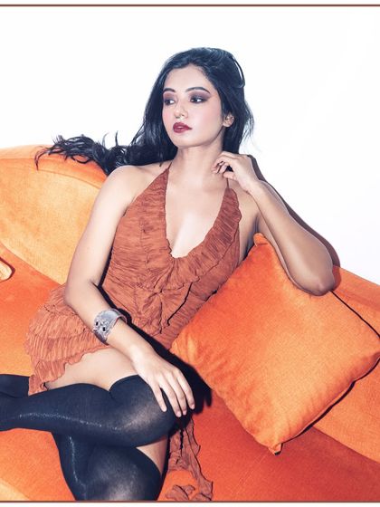 A classic, elegant pose that showcases both the fashion and the model's beauty. The off-camera look feels sophisticated and thoughtful. This demonstrates the range of shots I provide from a single fashion setup.