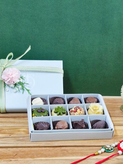 A smaller, equally delightful 12-piece box of our 'Rakhi ki Mitaas'. It's the perfect guilt-free indulgence, featuring an assortment of our finest dry fruit sweets for your sibling.