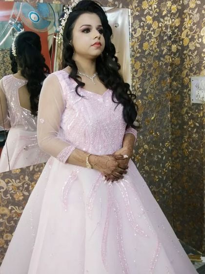 My beautiful engagement bride. I created a princess look for her with a stunning pink gown, soft curls, and glowing makeup.