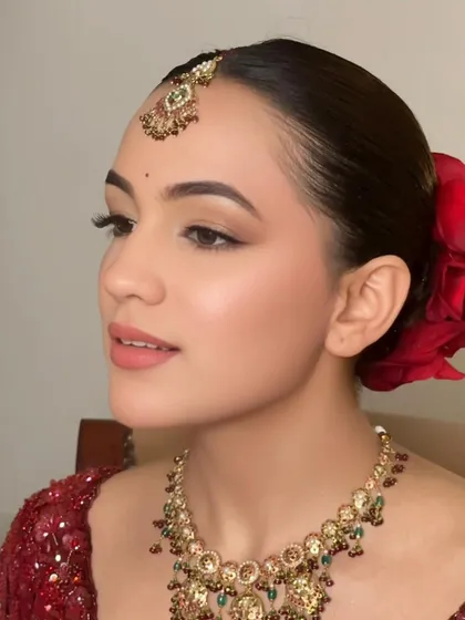 Simplicity is the ultimate sophistication. A close-up of Simran's wedding makeup, featuring clean lines, a soft base, and a beautiful nude-pink lip.
