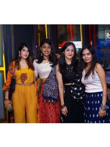 A group of friends at the Dandiya Madness event.