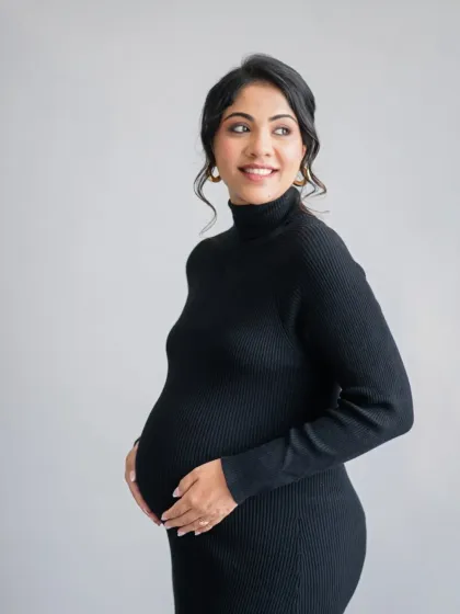 Maternity photography can be so powerful and elegant. For this modern maternity session, we chose a simple, classic black dress to create a timeless and sophisticated portrait that celebrates the beauty of pregnancy.