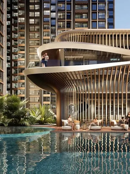 We designed this multi-level clubhouse for a large residential development in Central Mumbai. The parametric design, crafted using advanced software, creates a fluid, organic form that integrates seamlessly with the poolside lounge area, offering residents a luxurious space to relax and unwind.