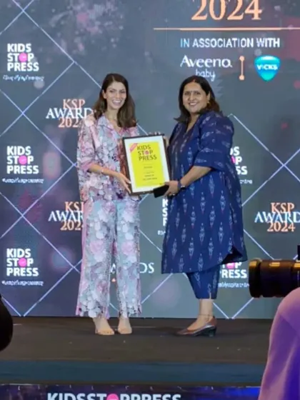 On stage receiving my award. A truly memorable moment that I will always cherish.