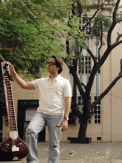 Another photo from the same day, with my sitar against the backdrop of trees and buildings. It's about finding music in everyday surroundings.