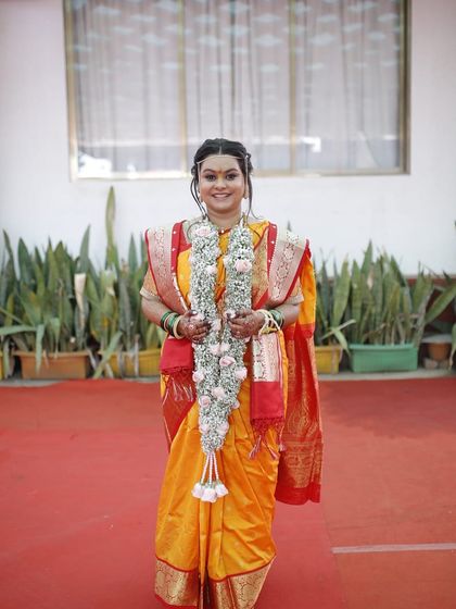 A full-length shot of a happy bride, ready for her wedding. This is the kind of bridal glow I aim to create for all my clients.
