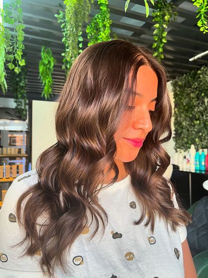 A soft and subtle French balayage that adds gentle dimension and a touch of light. This look is perfect for anyone wanting a low-maintenance color that grows out beautifully.