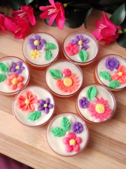 Replace your simple tealights with these modern, uniquely designed handcrafted candles. Because they are handmade, each candle arrives with a unique combination of flower colors and patterns.
