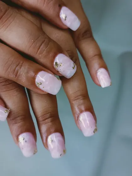 Another view of the beautiful pink quartz and gold foil manicure.